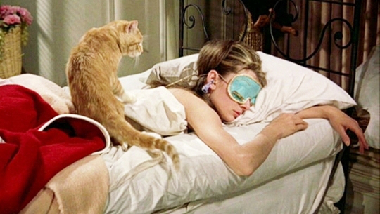 audrey-as-holly-in-sleep-mask_with-cat-on-back